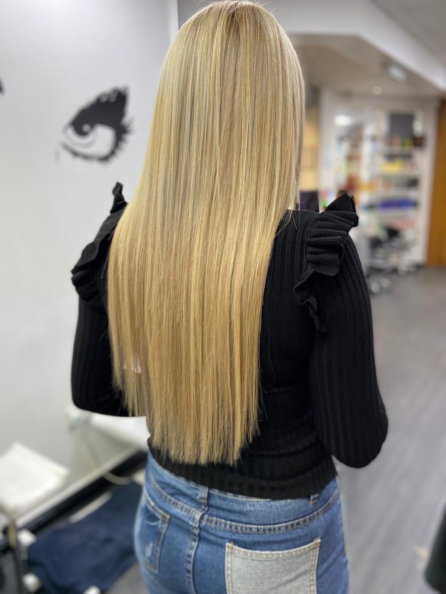 Long blonde hair extensions fitted at Lux Studio